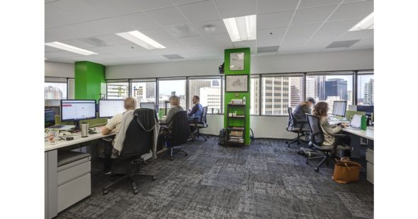 People working on their computers in an open space office