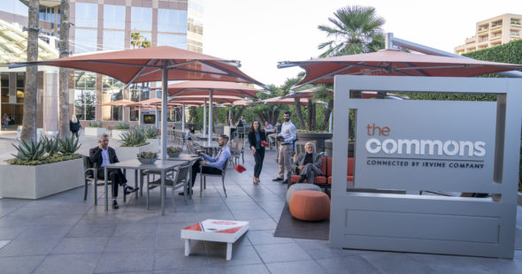 Photography of people enjoying The Commons, an outdoor workplace and gathering area, at Fox Plaza in Los Angeles, CA