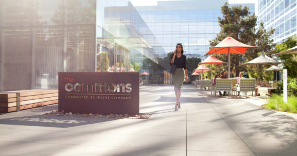 Photography of people enjoying The Commons, an outdoor workplace and gathering area, at Santa Clara Square in Santa Clara, CA