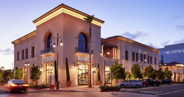Photo of some of the retail shops at Santa Clara Square Marketplace, including Sure la Table and Corepower Yoga in Santa Clara, CA