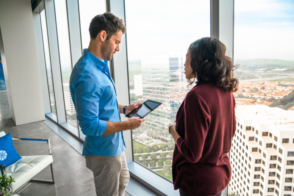 Lifestyle photography of the tour suite at 400 Spectrum Center Drive in Irvine, CA
